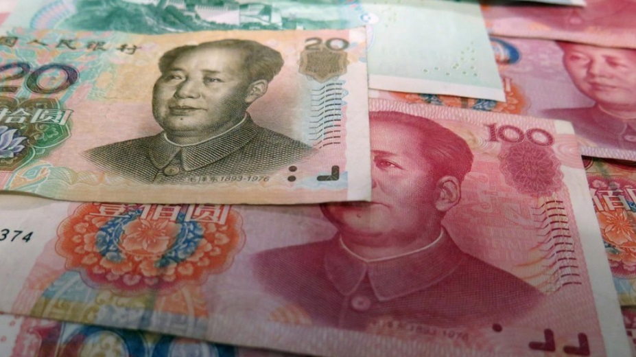 Китайцам заплатят за отказ от традиционных денег