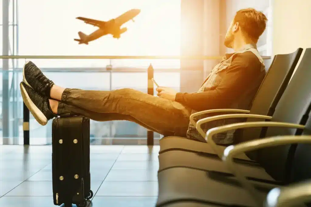 A businessman waits for his flight at the airport