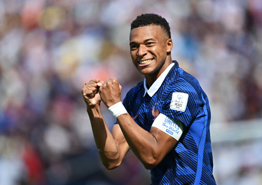 EAST RUTHERFORD, NEW JERSEY - JUNE 16: Kylian Mbappe #10 of France celebrates scoring his team's first goal during the FIFA World Cup 2026 Group I match between France and Senegal at New York New Jersey Stadium on June 16, 2026 in East Rutherford, New Jersey. (Photo by Shaun Botterill - FIFA/FIFA via Getty Images)