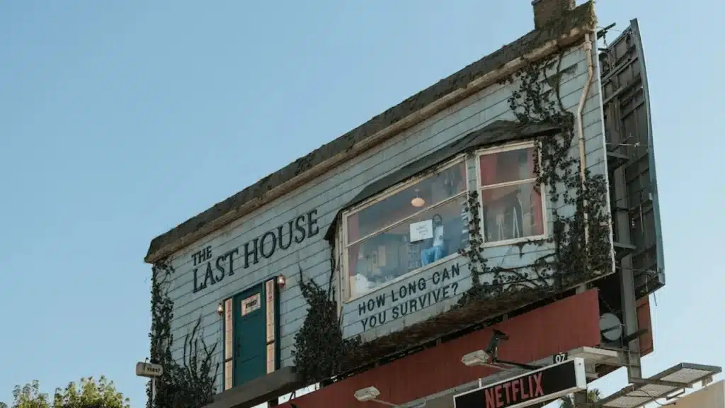Man lives inside billboard for Netflix’s “The Last House” promo