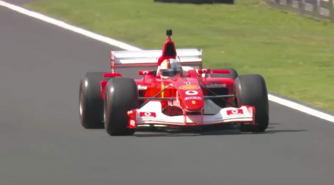 Sebastian Vettel drives Schumacher's Ferrari in Monza tribute