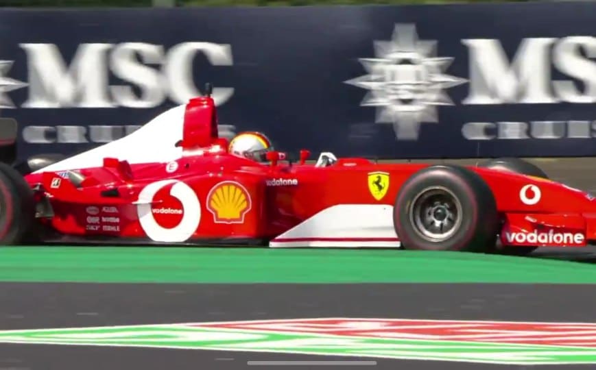 Sebastian Vettel drives Schumacher's Ferrari in Monza tribute