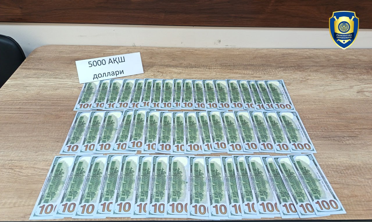Qibrayda davlat muassasasi rahbari 5 ming dollar bilan ushlandi